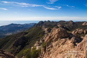 View looking west from Sandstone Peak. Two of the Channel Islands, Anacapa and Santa Cruz, can be seen in the distance. 