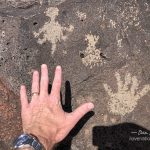 Petroglyph Piedras Marcadas Canyon comparing hands